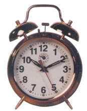 meccanical alarm clock - vintage table old mechanical alarm clock